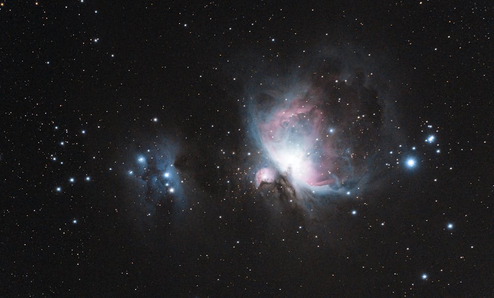 Physicists Discover Universal Rules Behind Quantum Entanglement Capture of the Orion Nebula (M42) with stars and galaxies in a celestial scene.