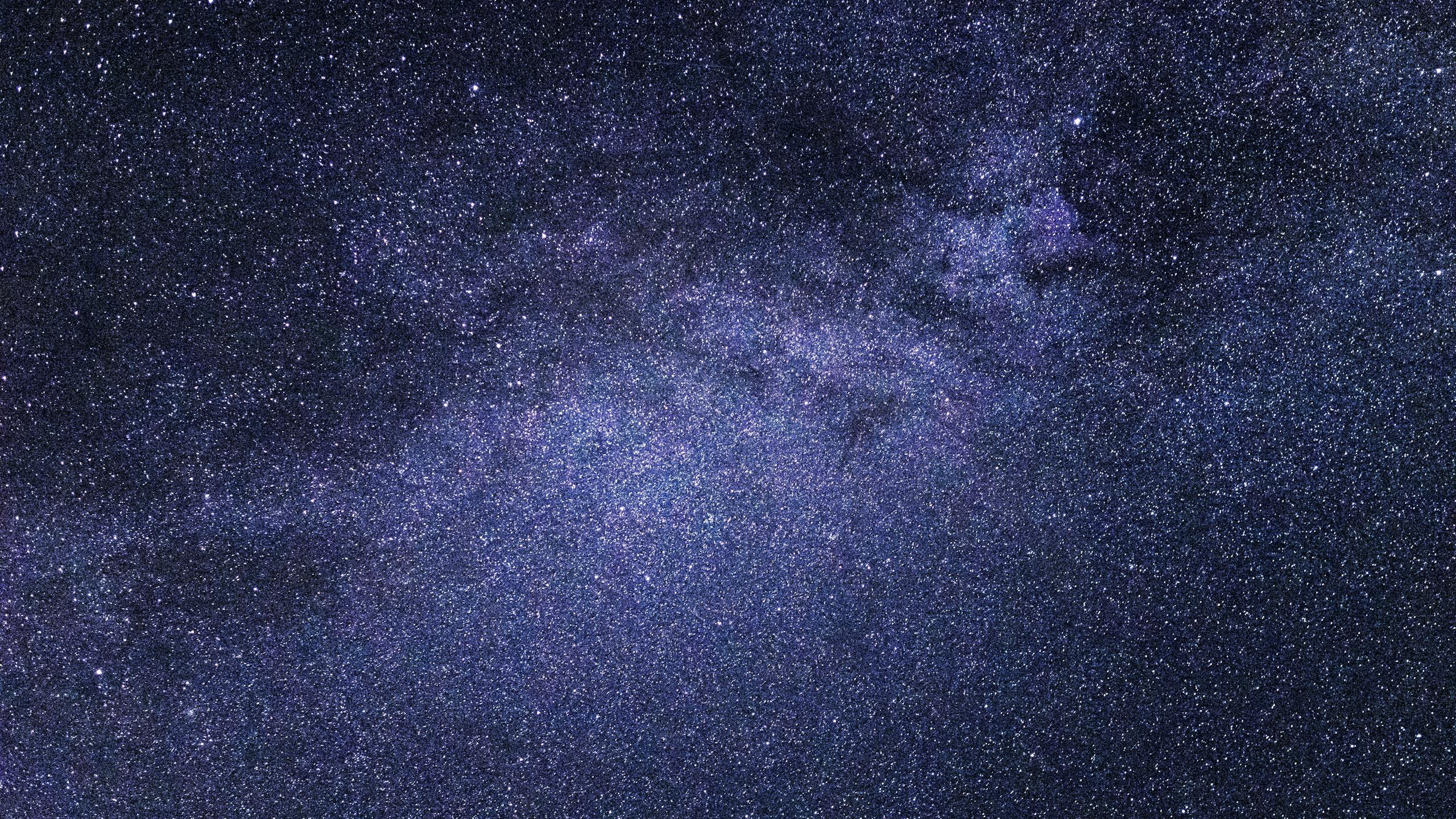 A breathtaking view of the starry night sky, showcasing a vibrant galaxy cluster.