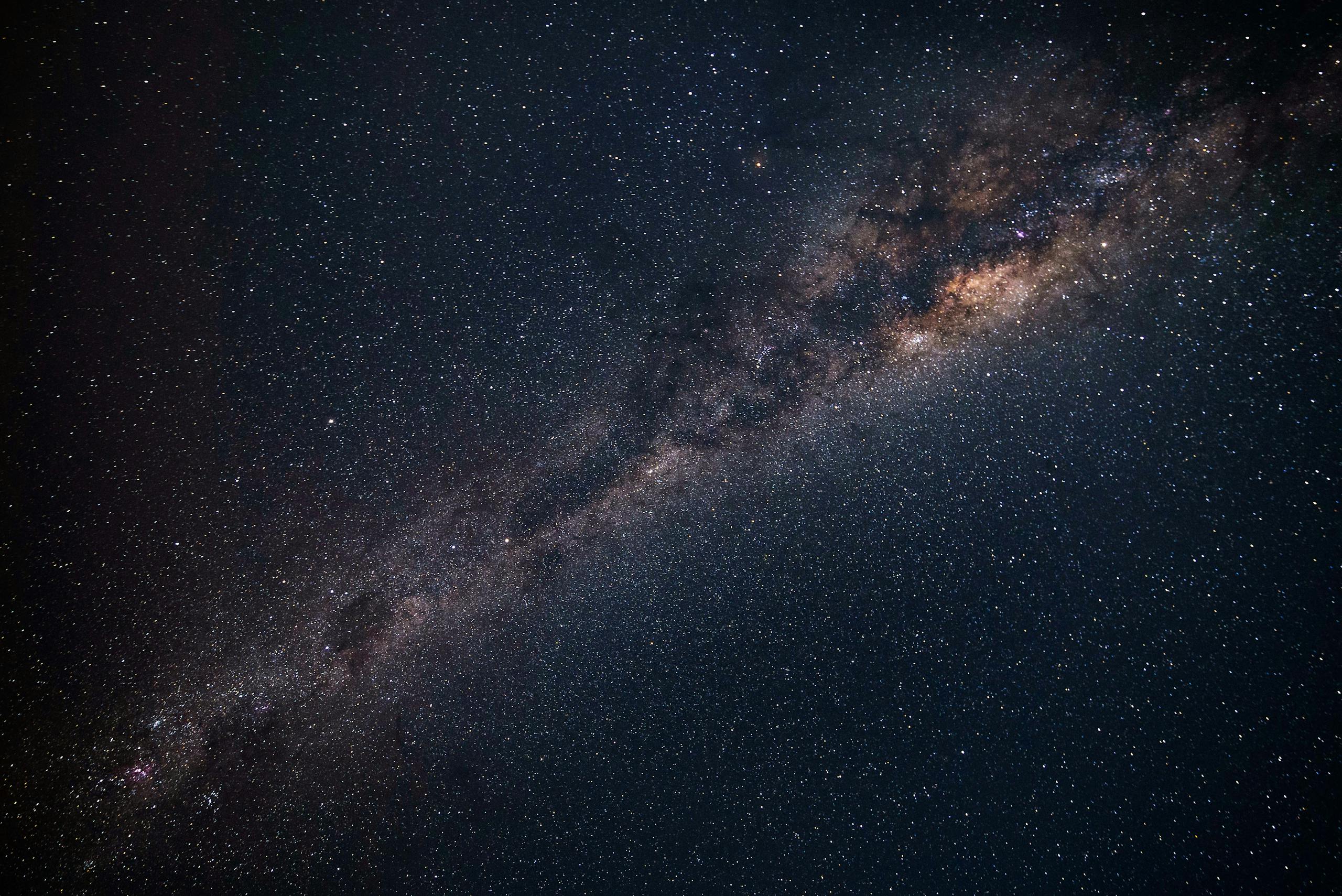 Are We Living in the Solitude Zone of the Universe? A breathtaking view of the Milky Way galaxy sparkling in the night sky over Punta Ballena, Uruguay.