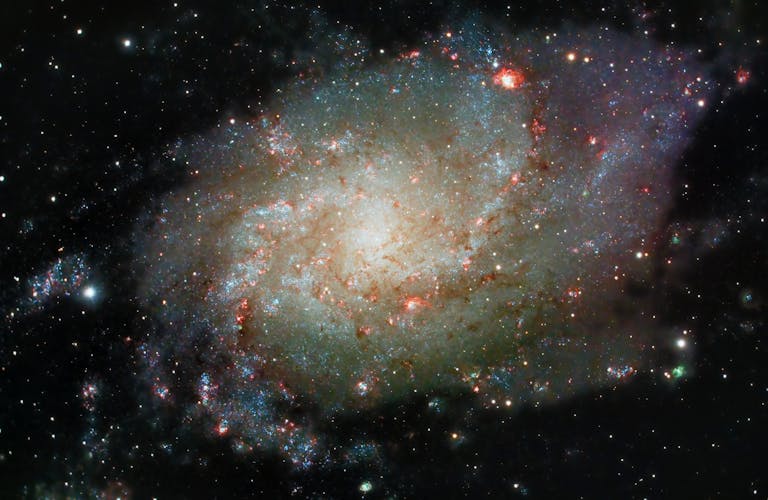 Constraints on Space-Based Solar Power Satellites Are More Grounded Than You Might Think Explore the majestic spiral galaxy M33 with its vibrant cosmic colors, an astronomical wonder in the night sky.