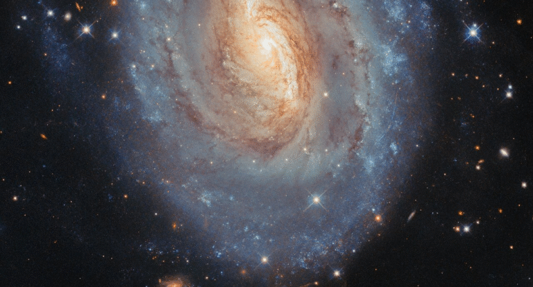 Hubble’s Stunning Capture of Galaxy NGC 6000: A Clash of Old and New Stars