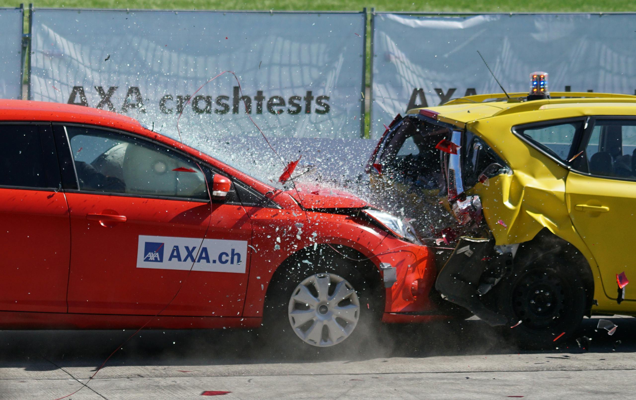 Over 40% of Drivers Killed in Crashes Had THC in Their Blood — What the New Study Reveals About Cannabis and Driving Red and yellow cars shown in a head-on collision during a crash test for safety evaluation.