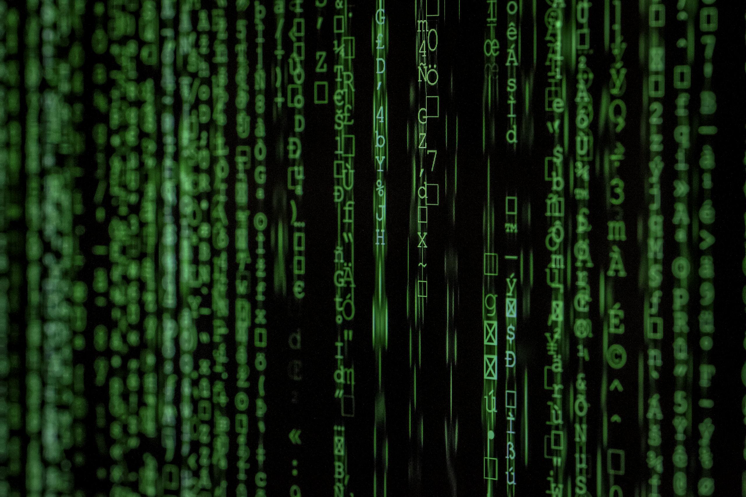 Abstract green matrix code background with binary style.