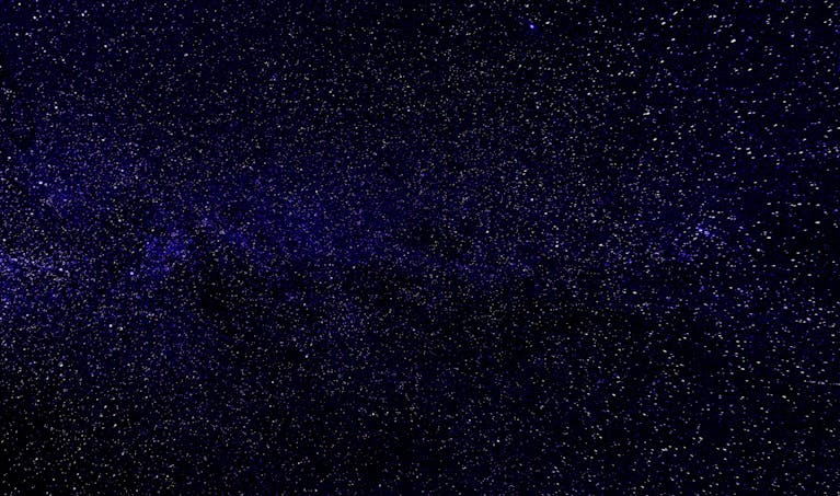 Explore the vast universe with this beautiful night sky filled with stars and galaxies.