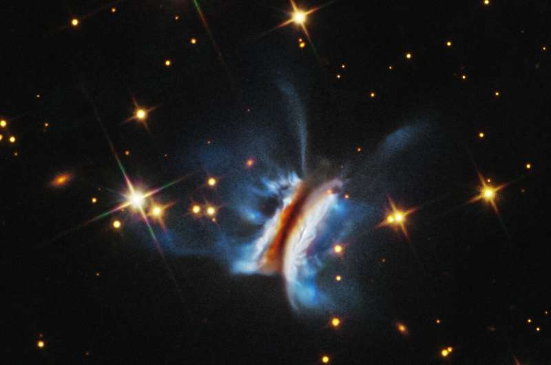 Hubble Reveals the Largest and Most Chaotic Planet-Birthing Disk Ever Observed