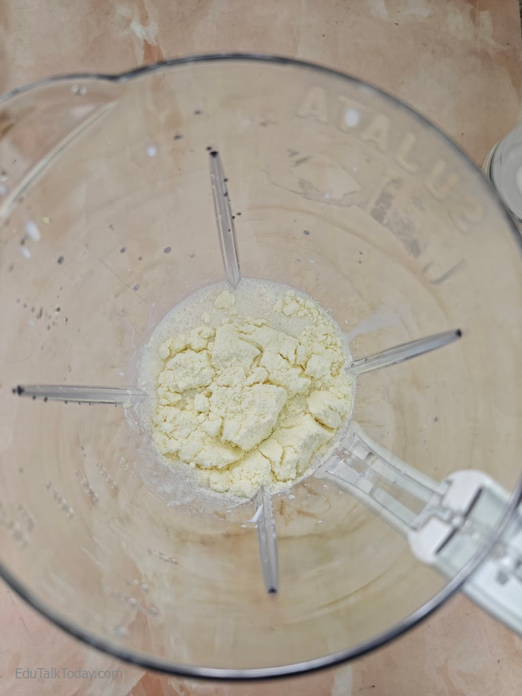 Oats Tahini Protein Smoothie Protein powder added to Milk in a Blender jar